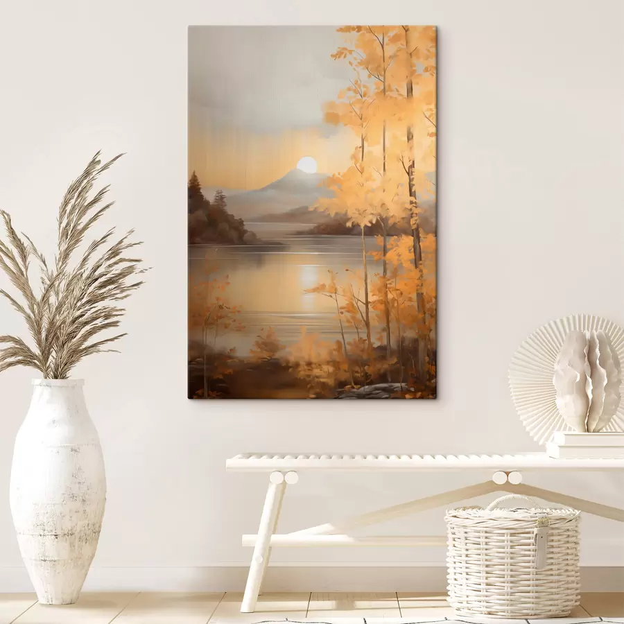 Obraz Jesenné stromy s oranžovými listami rámujú pokojné jazero s diaľkovými horami pod zamračenou oblohou. s47440